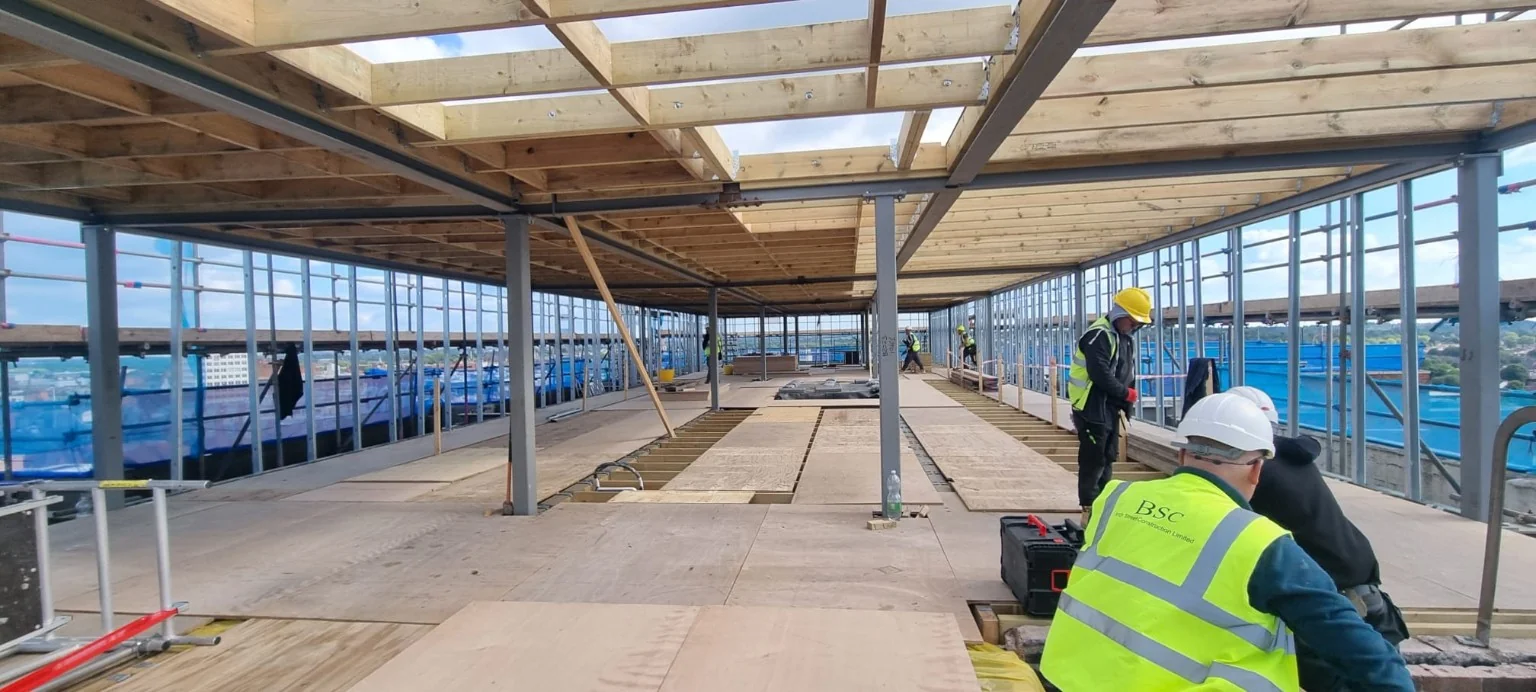 Additional rooftop storey with structural and lightweight wall framing